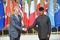 G7 Taormina Paolo Gentiloni Yemi Osinbajo handshake 2017-05-27.jpg