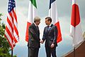 G7 Taormina Paolo Gentiloni Emmanuel Macron handshake 2017-05-26.jpg